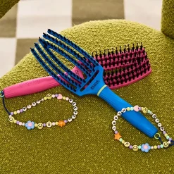 Brosse démêlante Fingerbrush édition limitée Inner Child lollipop pink